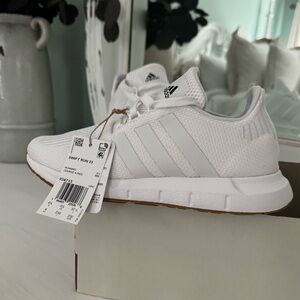 Women's all white Adidas Swift Run Sneaker